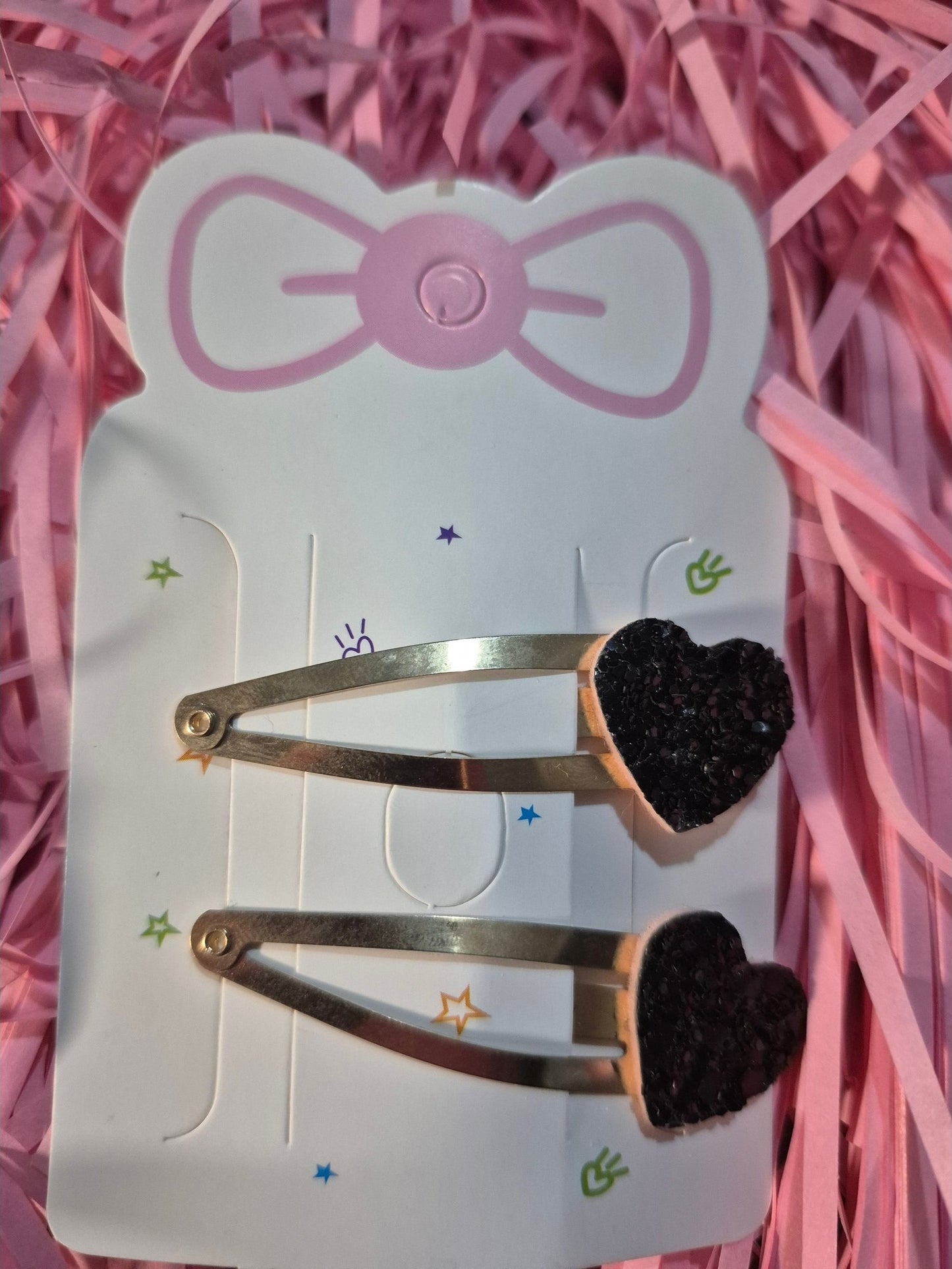 2 black heart shapped glitter bendy clips £1