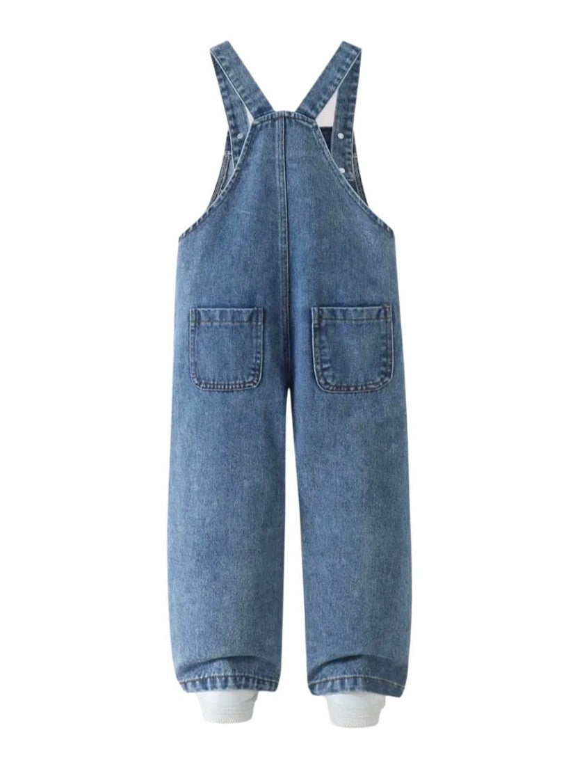 Blue denim overalls on a white background