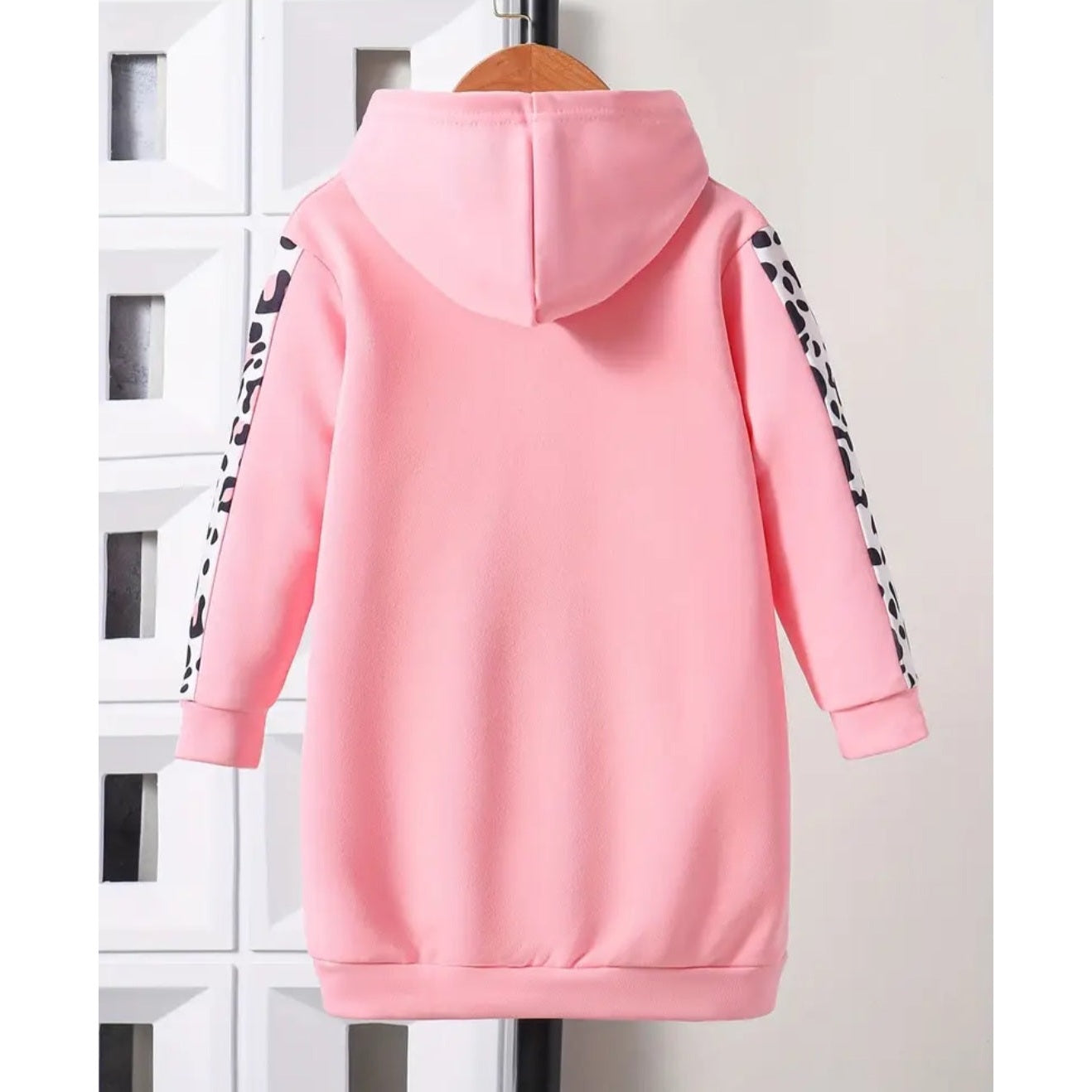 Back of girl's pink hoodie 