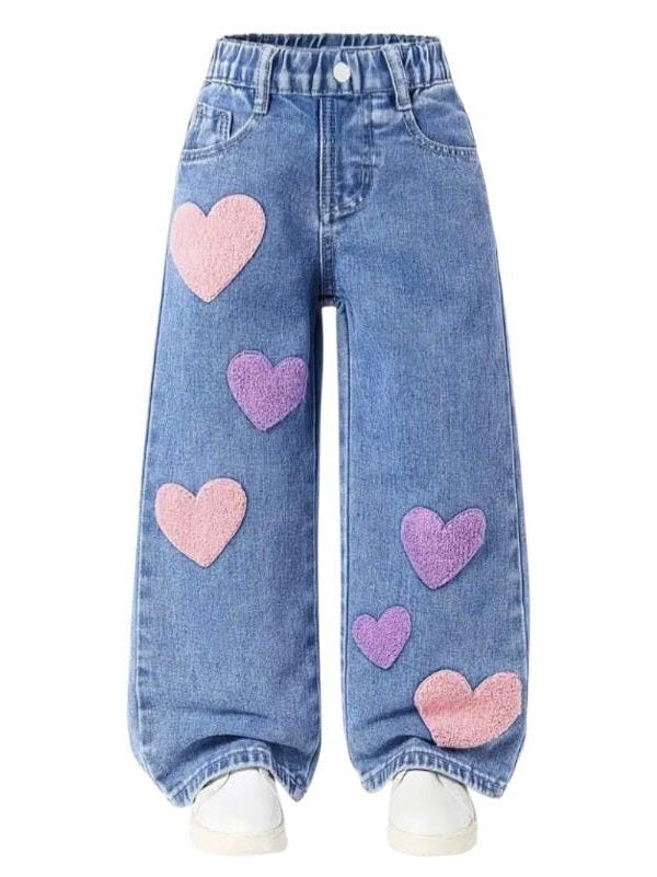 Blue jeans with pink hearts on a white background