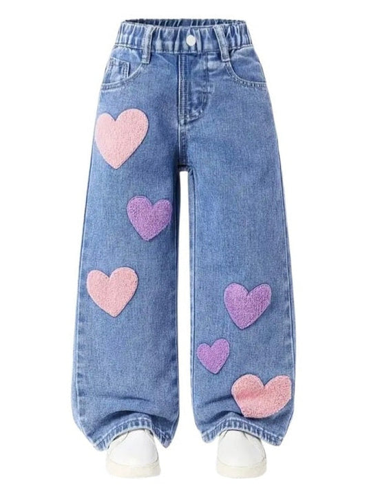 Blue jeans with pink hearts on a white background