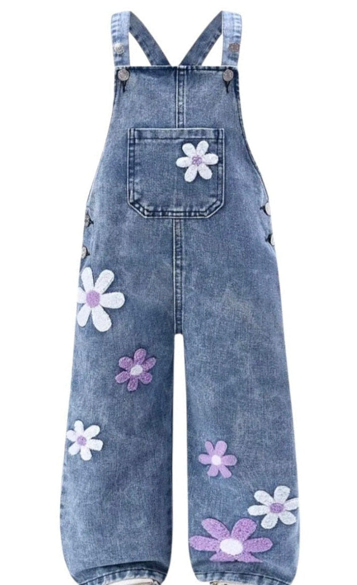Denim overalls with floral patterns on a white background